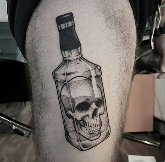 Sobriety Triumph: Symbolic Bottle with Skull Tattoo Design - Recovery Tattoo Ideas
