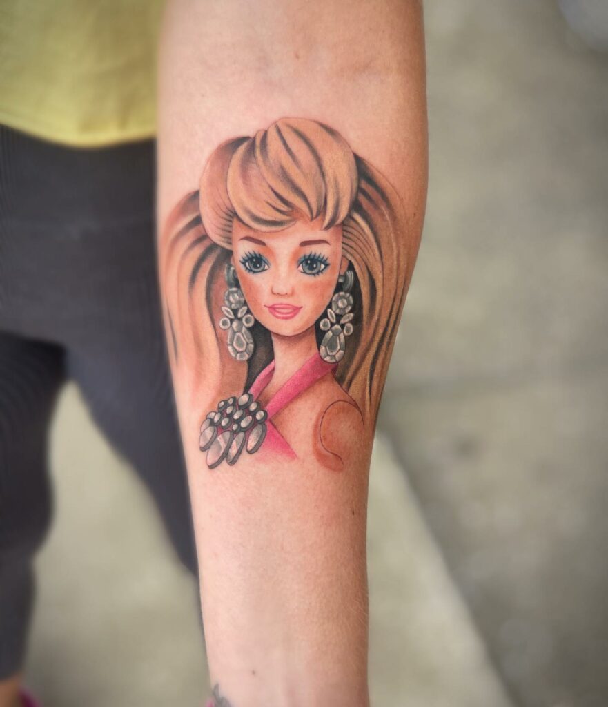 Barbie with Jewelrey Tattoo Design on arm