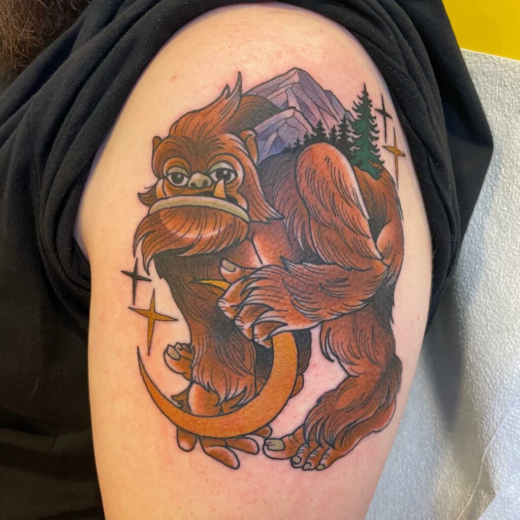cartoonish tattoo of Bigfoot