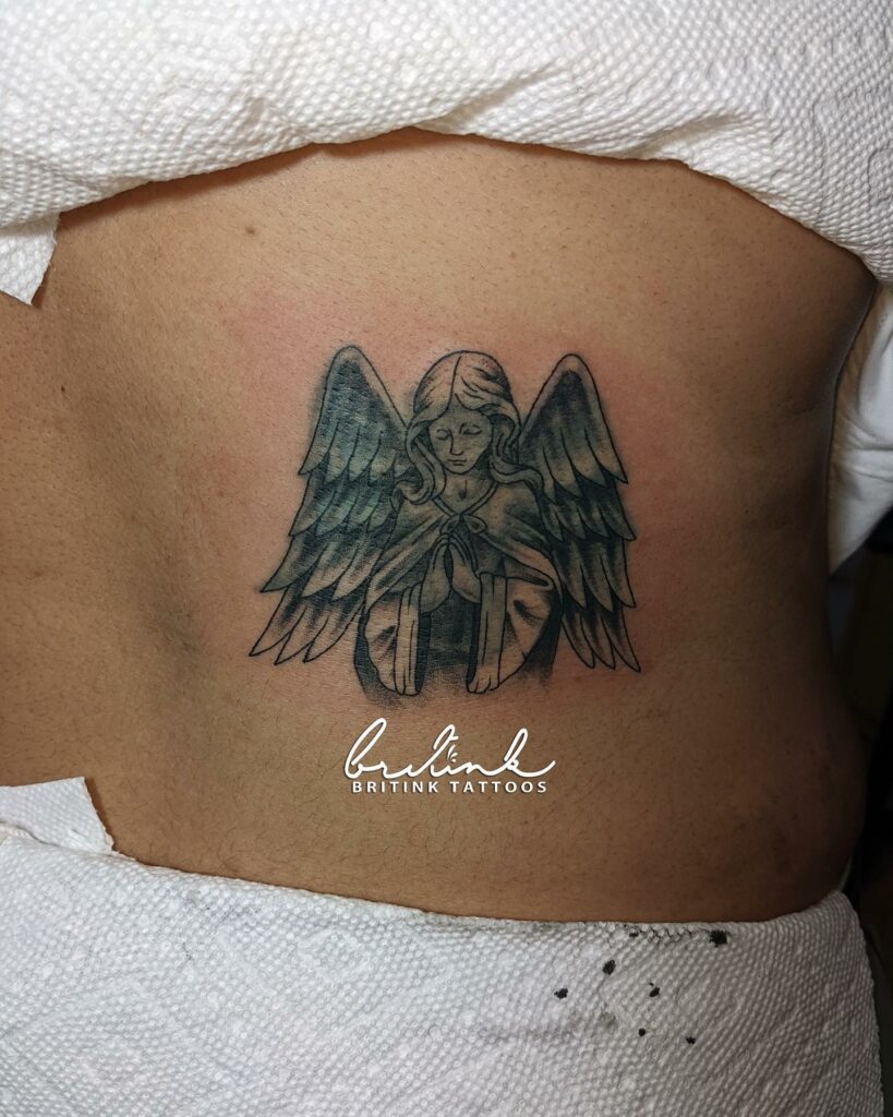 Angel Wing Lower Back Tattoo