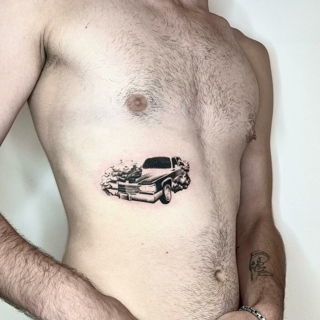Black And Grey Cadillac Tattoo On The Body
