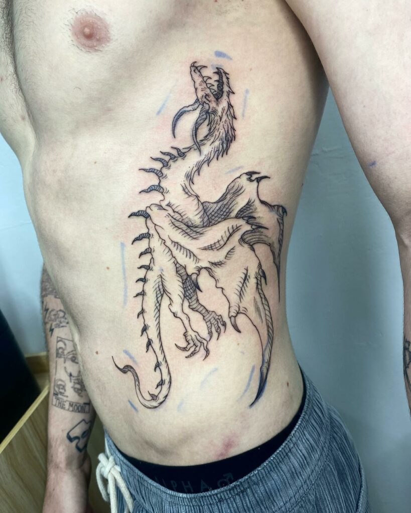 Brown Dragon Rib Tattoo