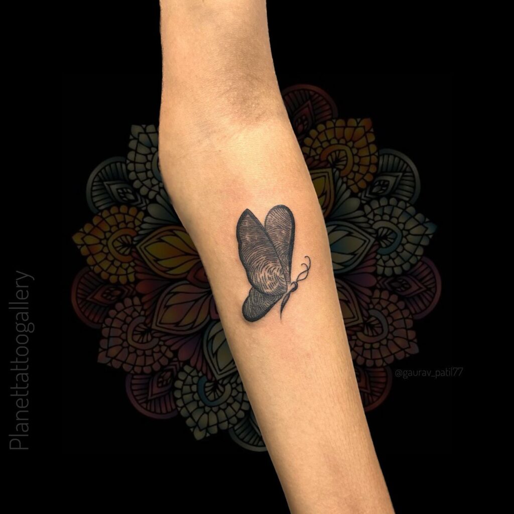 Butterfly Fingerprint Tattoo