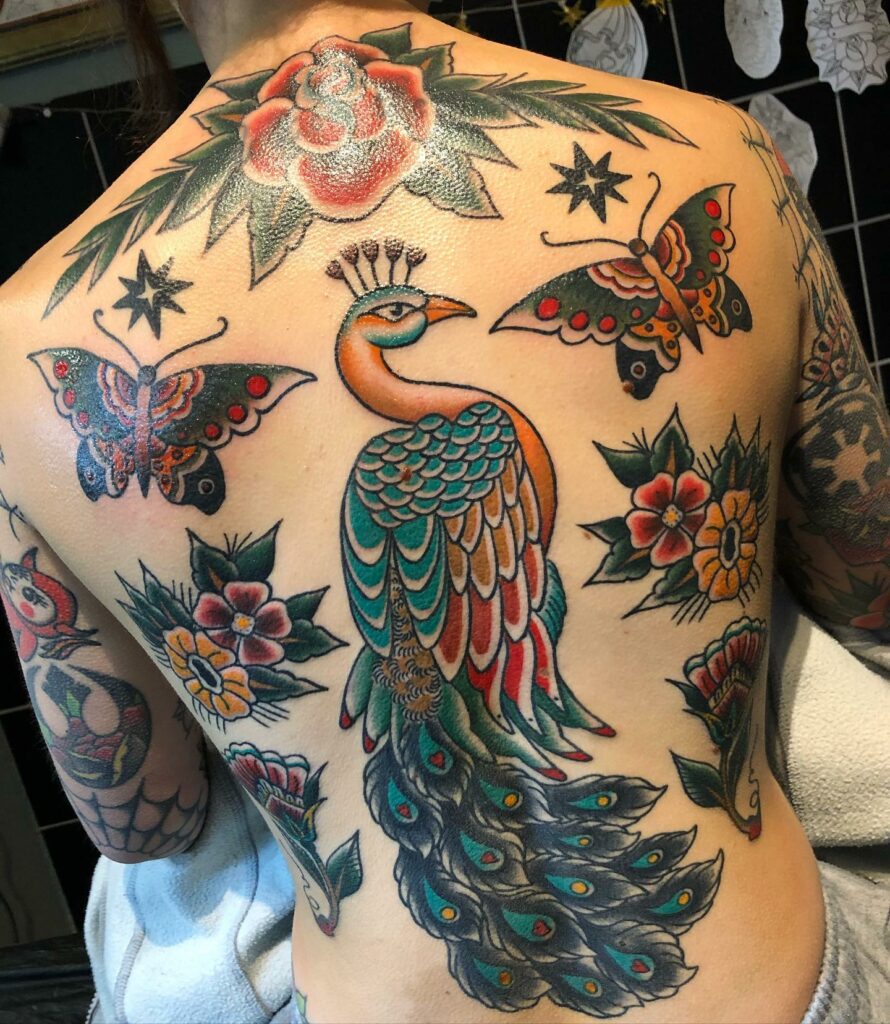 Peacock Lower Back Tattoo