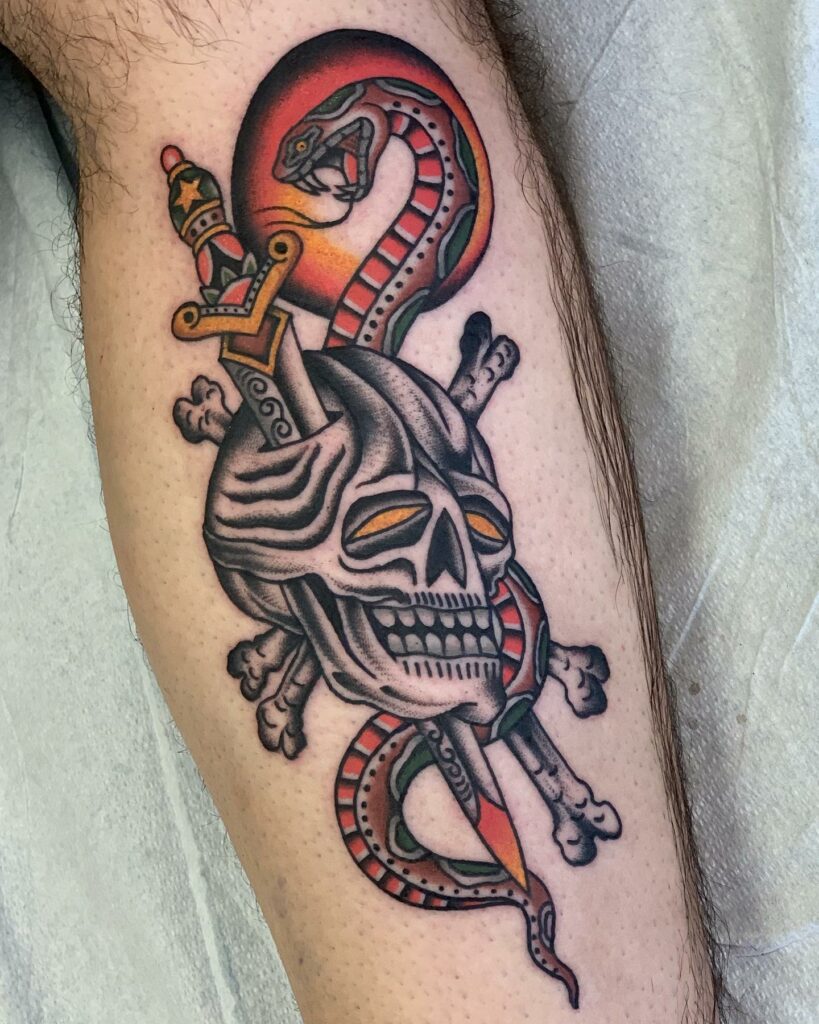Skull and dagger tattoo