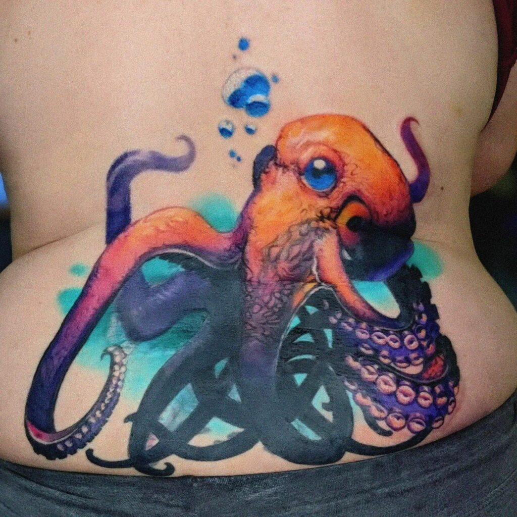 Watercolor Lower Back Tattoo