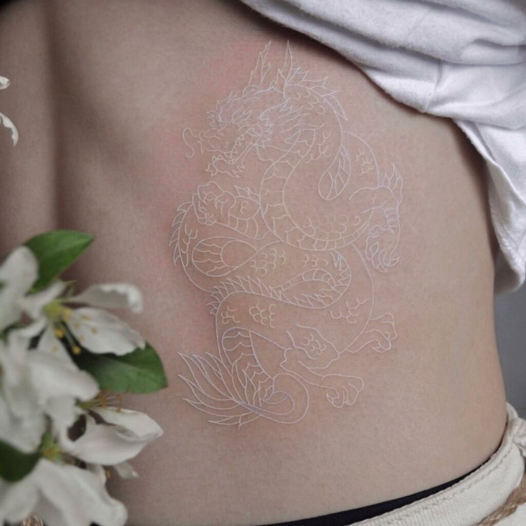 White Dragon Rib Tattoo