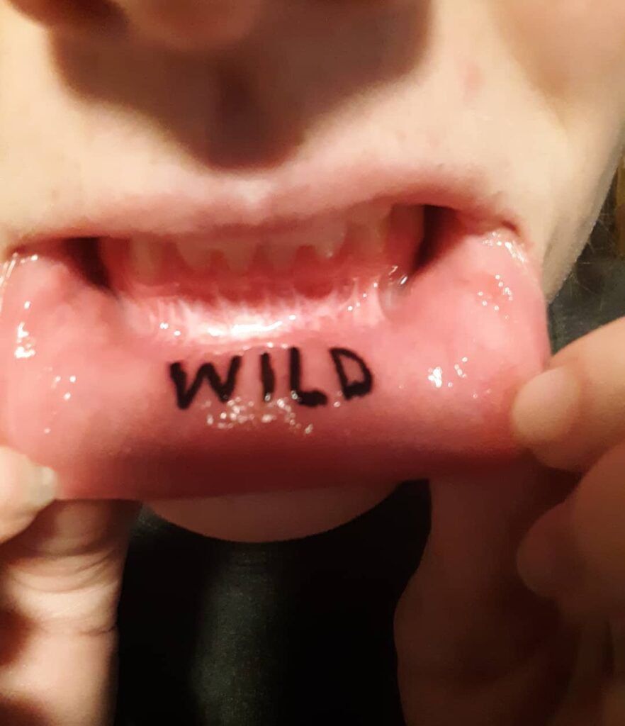 Wild Lip Tattoo