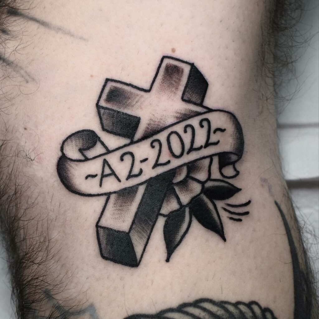 cross rip tattoo