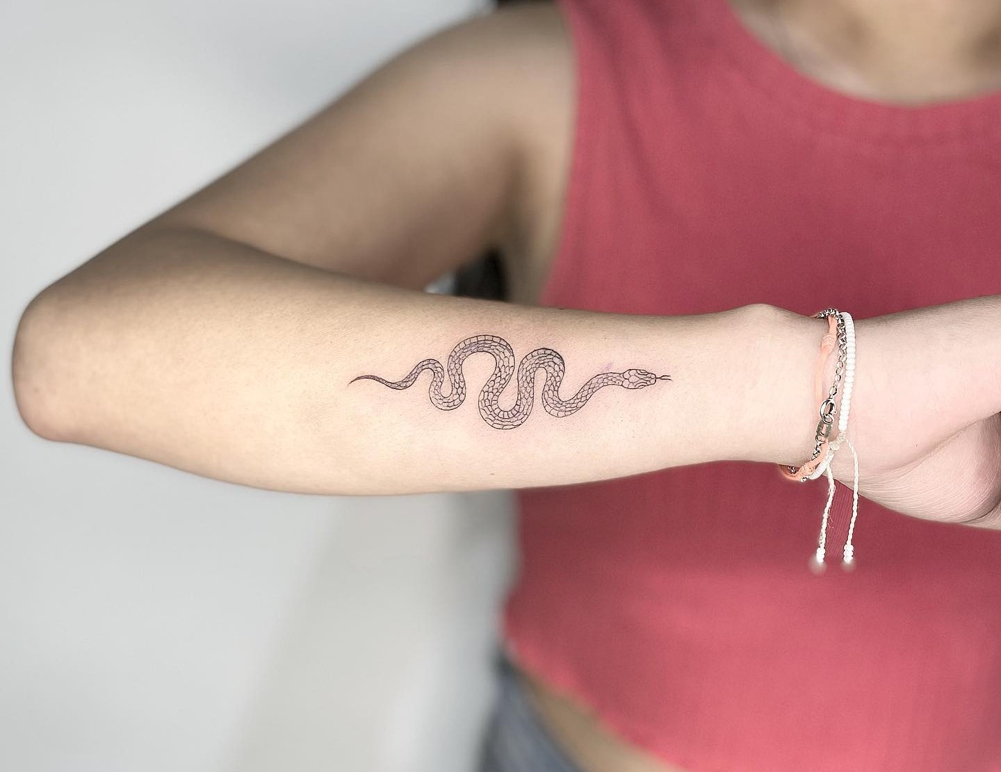 snake wrist tattoo wrap around arm｜TikTok Search