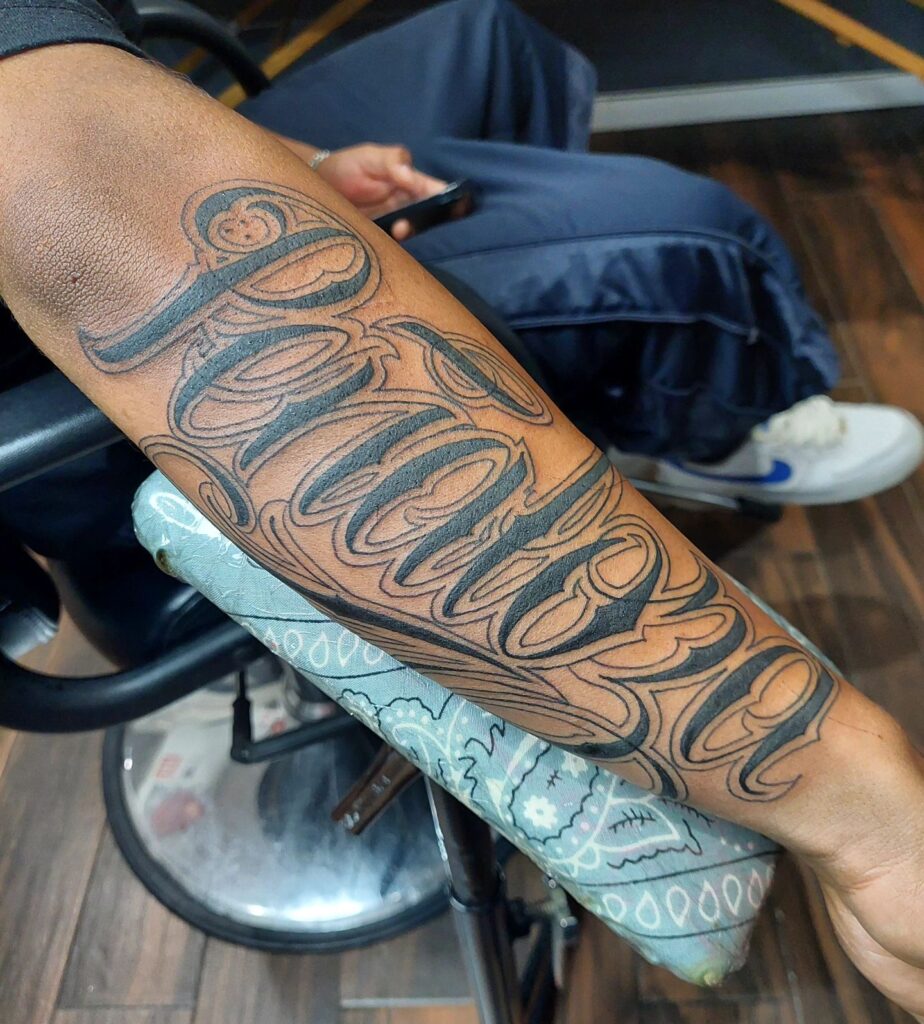 Last Name Tattoo